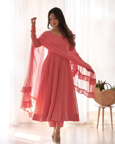 Luxuriant Peach Color Heavy Pure Soft Faux Georgette Lucknowi Sequence Work Anarkali Gown