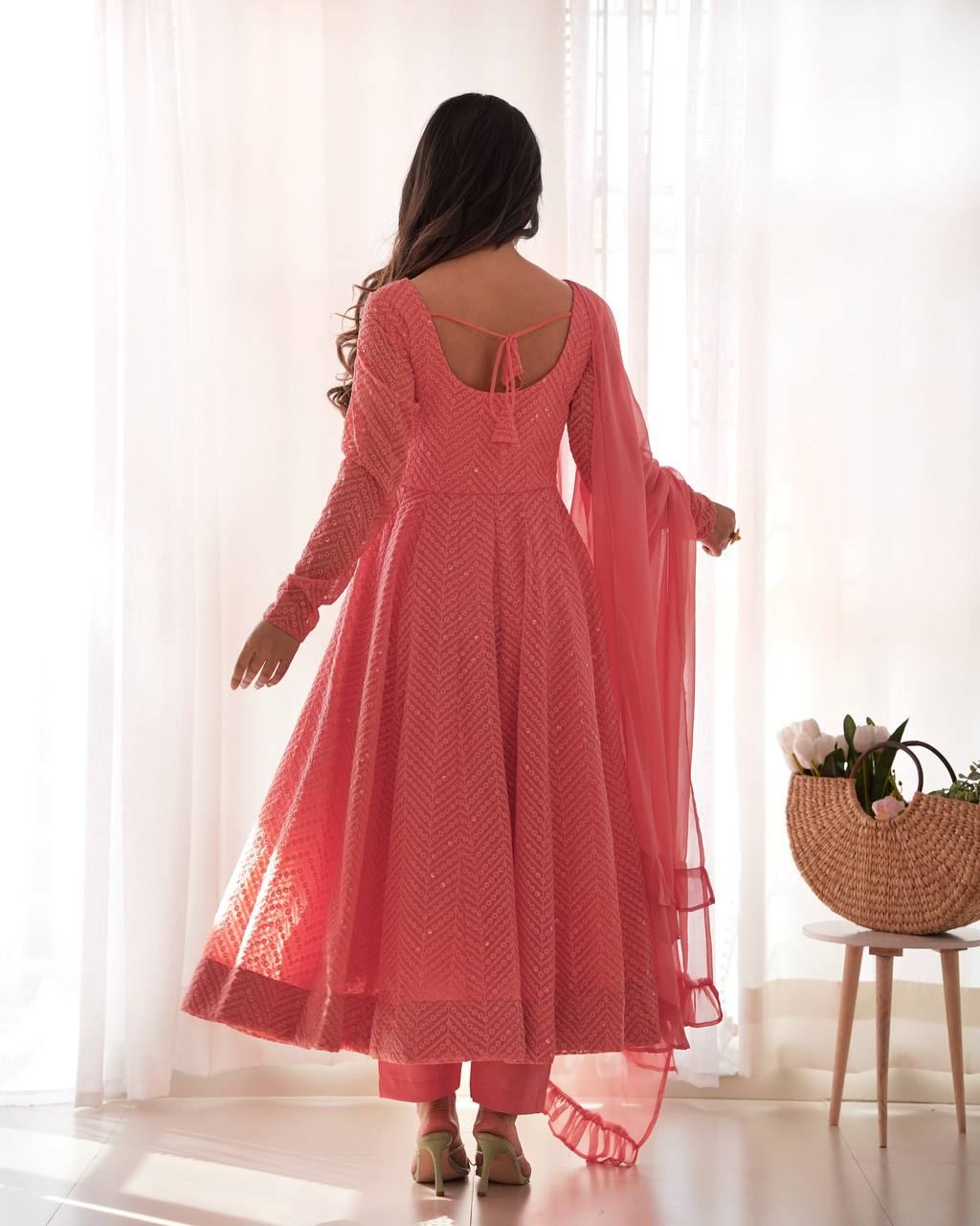Luxuriant Peach Color Heavy Pure Soft Faux Georgette Lucknowi Sequence Work Anarkali Gown