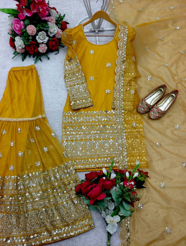 Function Wear Haldi Special Yellow Color Pure Soft Twine Net With Heavy Embroidery Work Sharara Suit