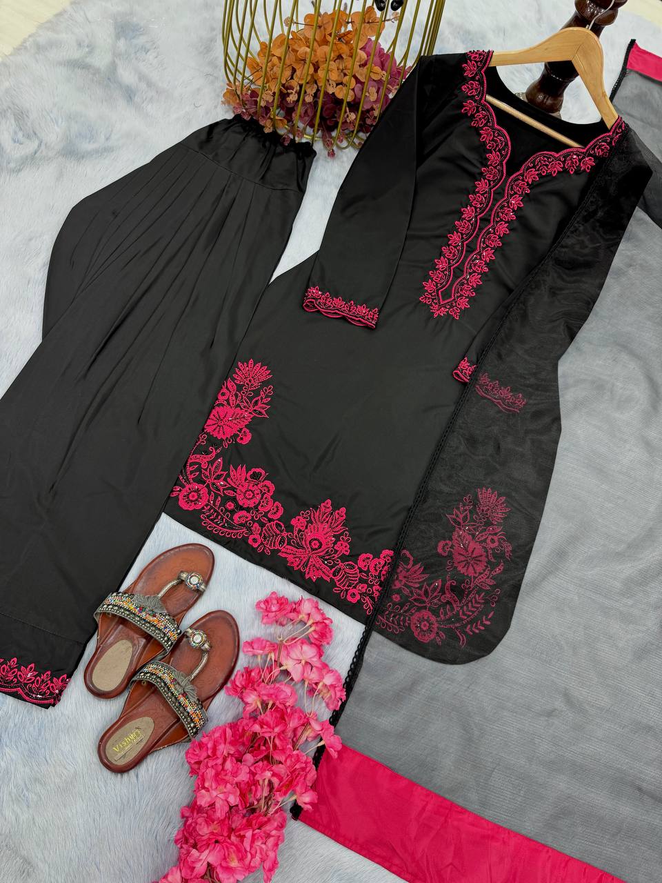 Fabulous Black Color Pure Natural Crepe With Embroidery Work Palazzo Suit