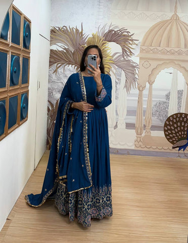 Function Wear Teal Blue Color Embroidery Work On Daman Patta Gown With Flair
