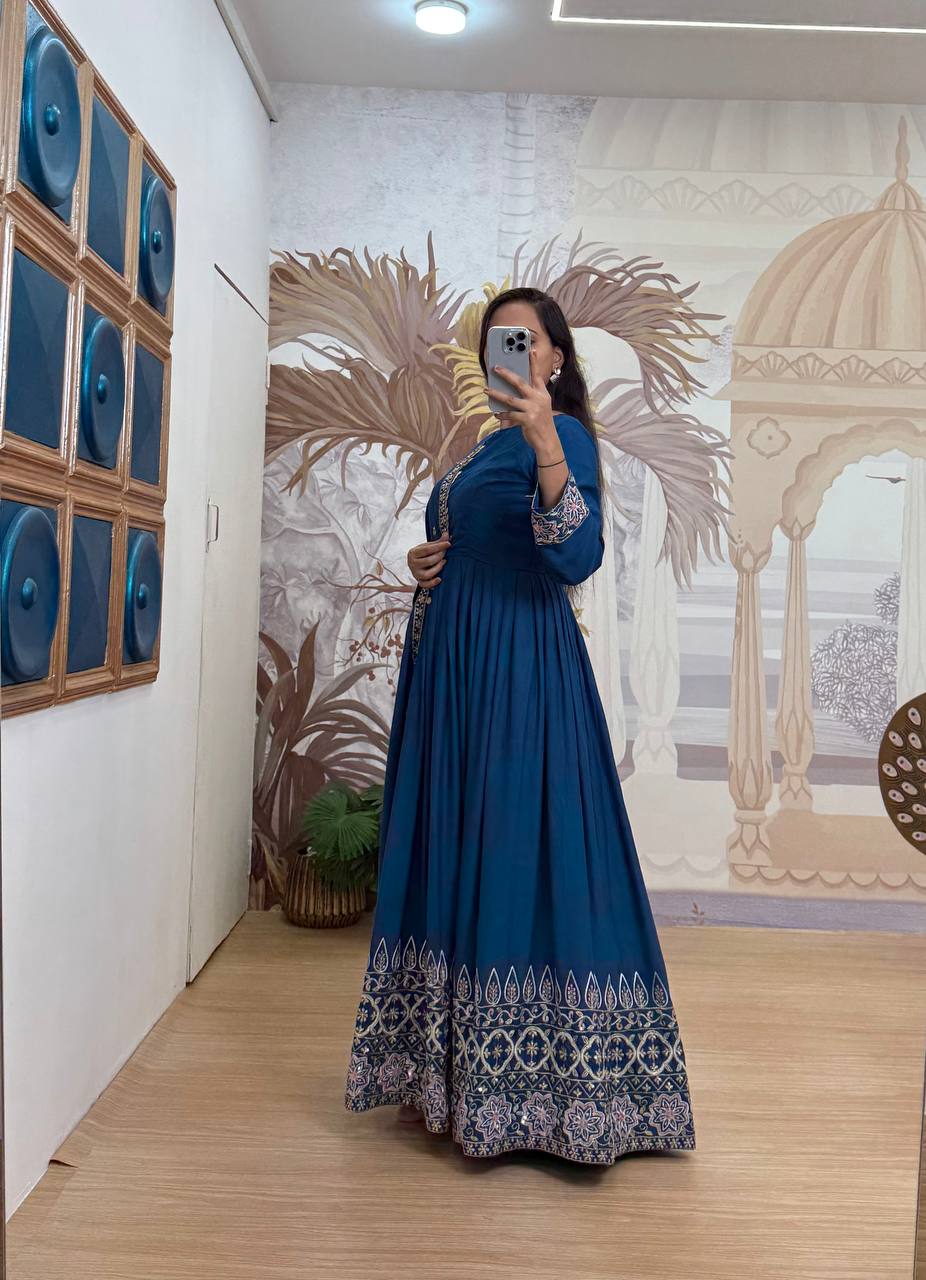 Function Wear Teal Blue Color Embroidery Work On Daman Patta Gown With Flair