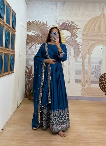 Function Wear Teal Blue Color Embroidery Work On Daman Patta Gown With Flair