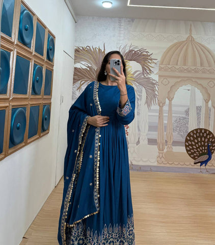 Function Wear Teal Blue Color Embroidery Work On Daman Patta Gown With Flair
