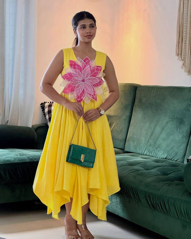 Innovative Yellow Color Parampara Silk And Fancy Flowers Cutting Pasting Work Gown