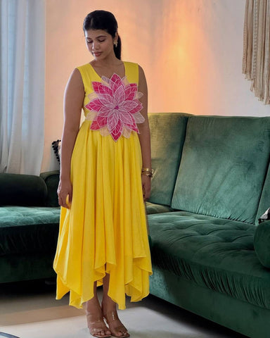 Innovative Yellow Color Parampara Silk And Fancy Flowers Cutting Pasting Work Gown