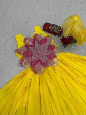 Innovative Yellow Color Parampara Silk And Fancy Flowers Cutting Pasting Work Gown