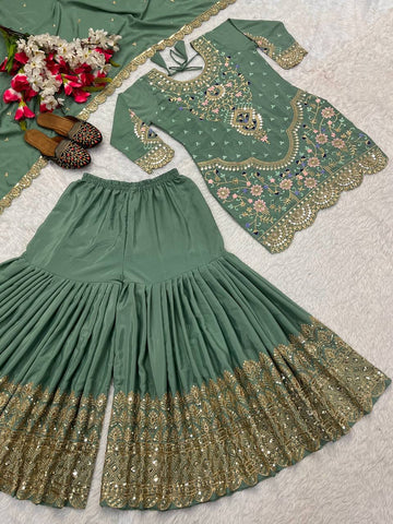Stunning Green color Natural Crep Material With Sequence Embroidery Work Sharara Suit