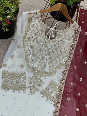 Party Wear Maroon Color Heavy Faux Georgette With Embroidery Sequence Work Sharara Suit