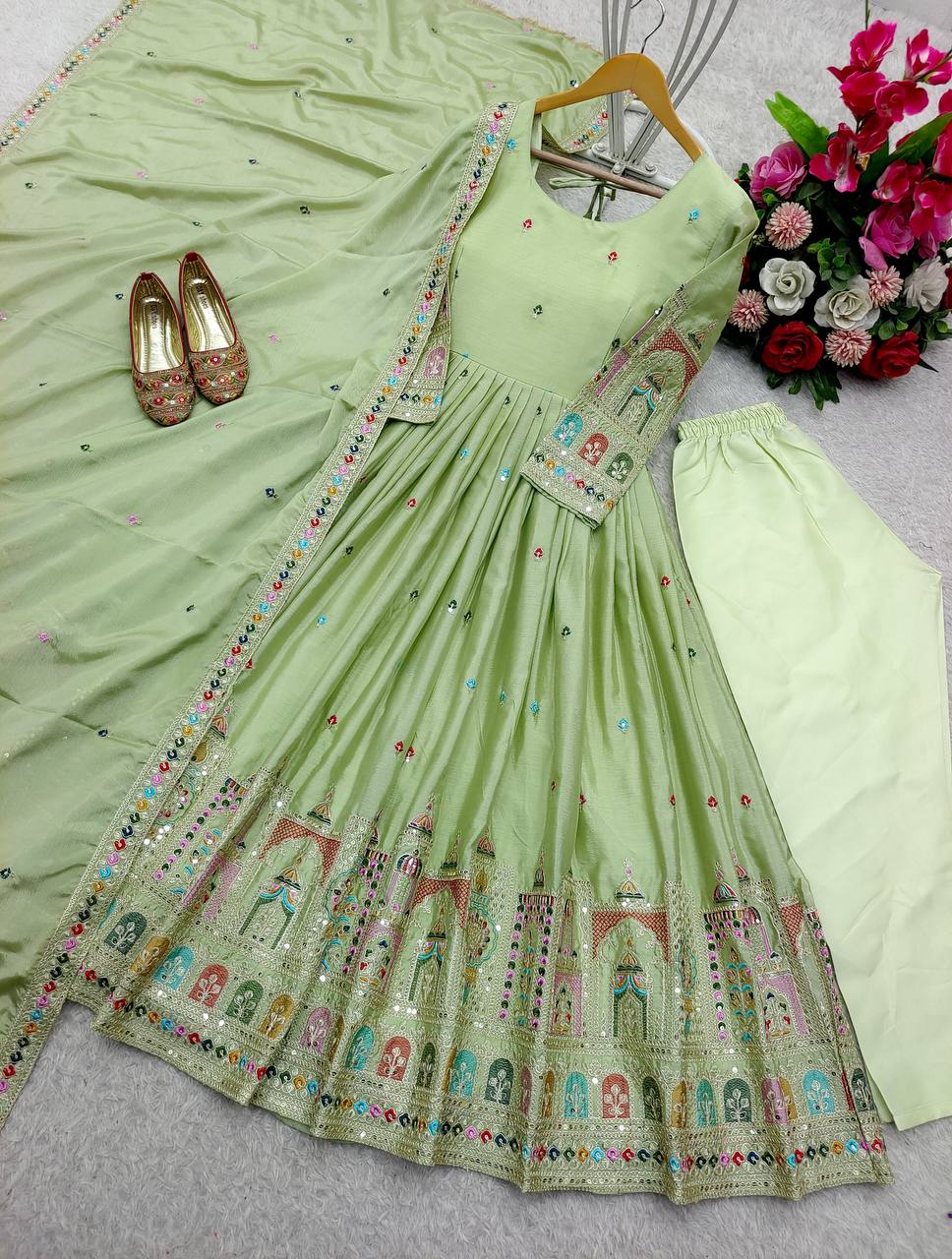 Celebrity Style Light Green Color Pure Cinon Silk With Heavy Embroidery Sequence Work Anarkali Gown