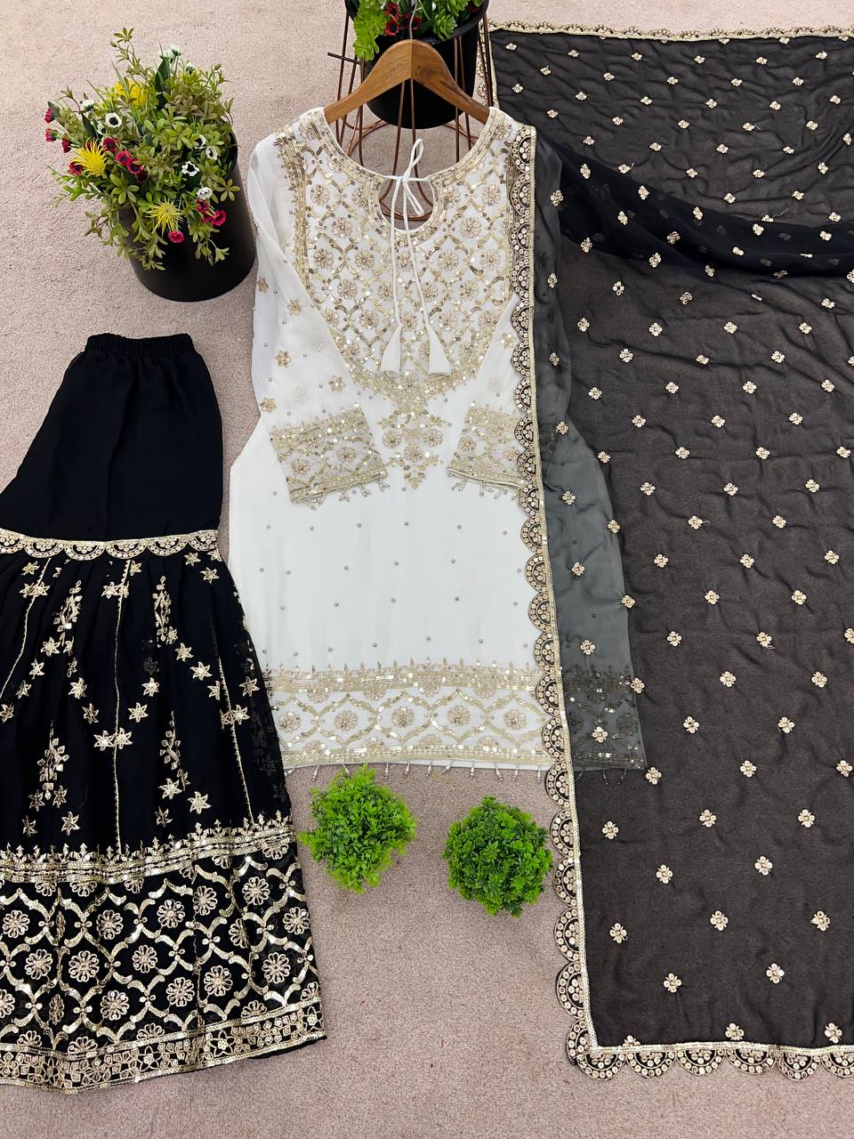 Admiring Black Color Heavy Faux Georgette With Embroidery Sequence Work Sharara Suit