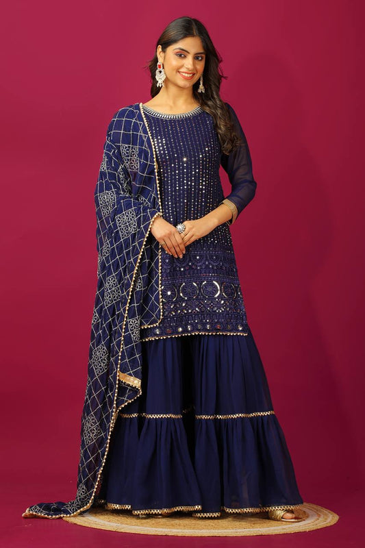 Eyes Catching Navy Blue Color Faux Georgette With Heavy Embroidery And 5mm Sequence Work Sharara Suit