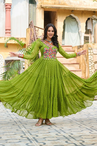 Traditional Wear Green Color Laheriya Printed Kutchi Patchwork Navratri Gown