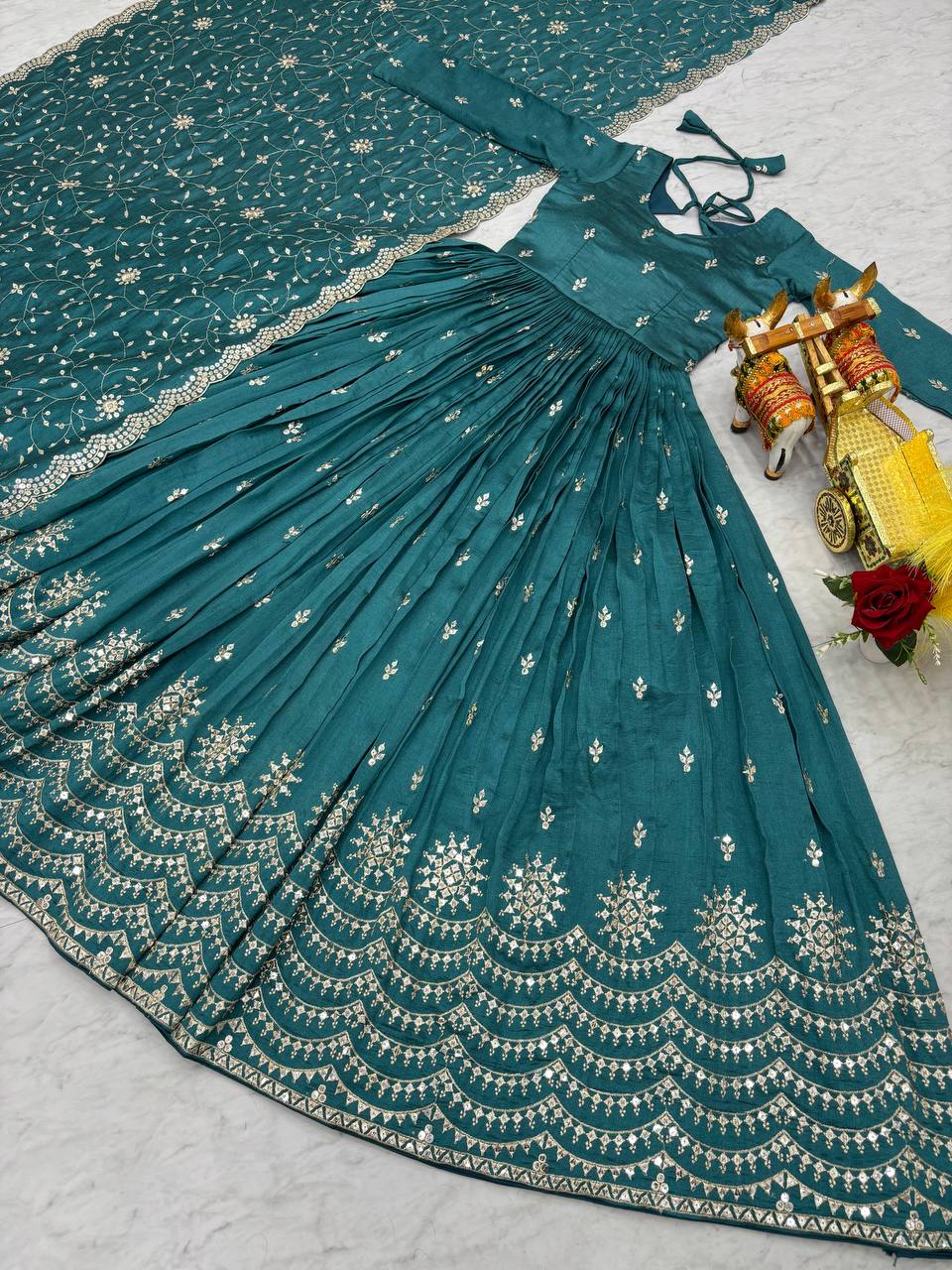 Wedding Wear Teal Green Color Pure Vichitra Silk And Sequence Embroidery Work Gown