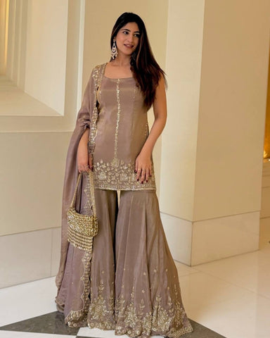 Wedding Wear Dusty Peach Color Embroidery And Sequence Work Sharara Suit