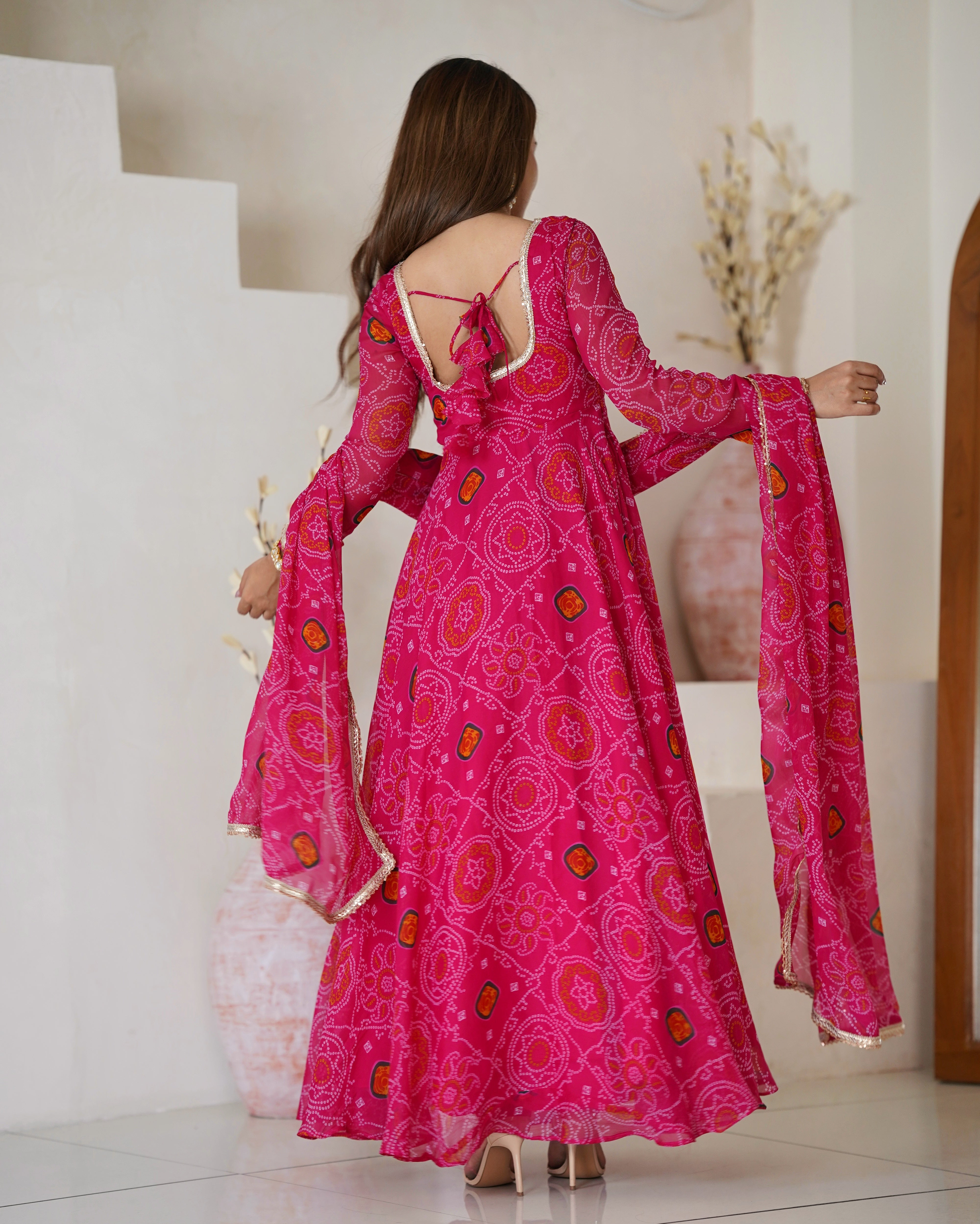 Function Wear Rani Pink Color Pure Soft Lightweight Chiffon Bandhej Fabric Designer Gown