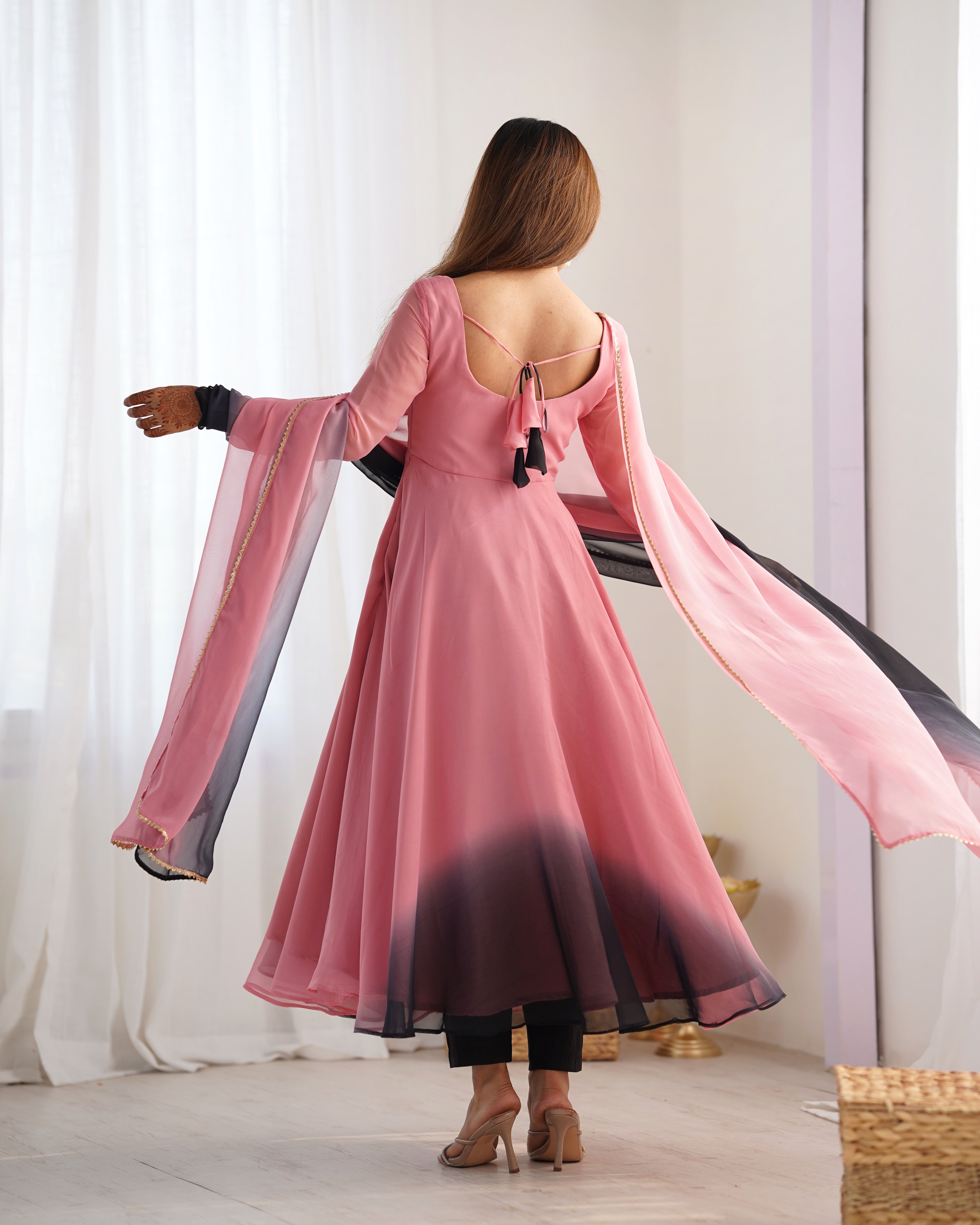 Luxuriant Peach And Black Color Heavy Pure Soft Faux Georgette Designer Anarkali Gown