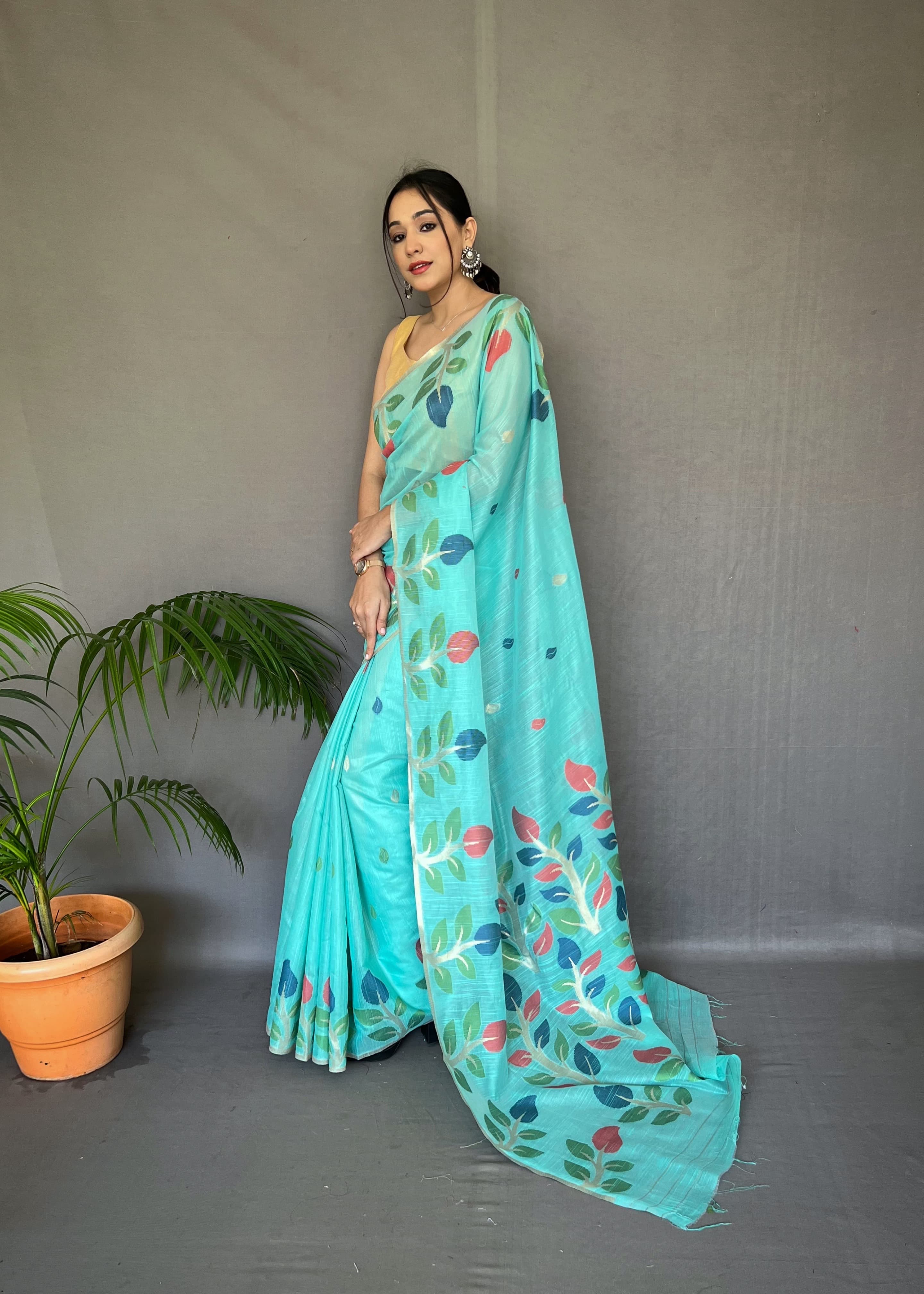 Beautiful Aqua Blue Color Printed Linen Saree With Meenakari Work