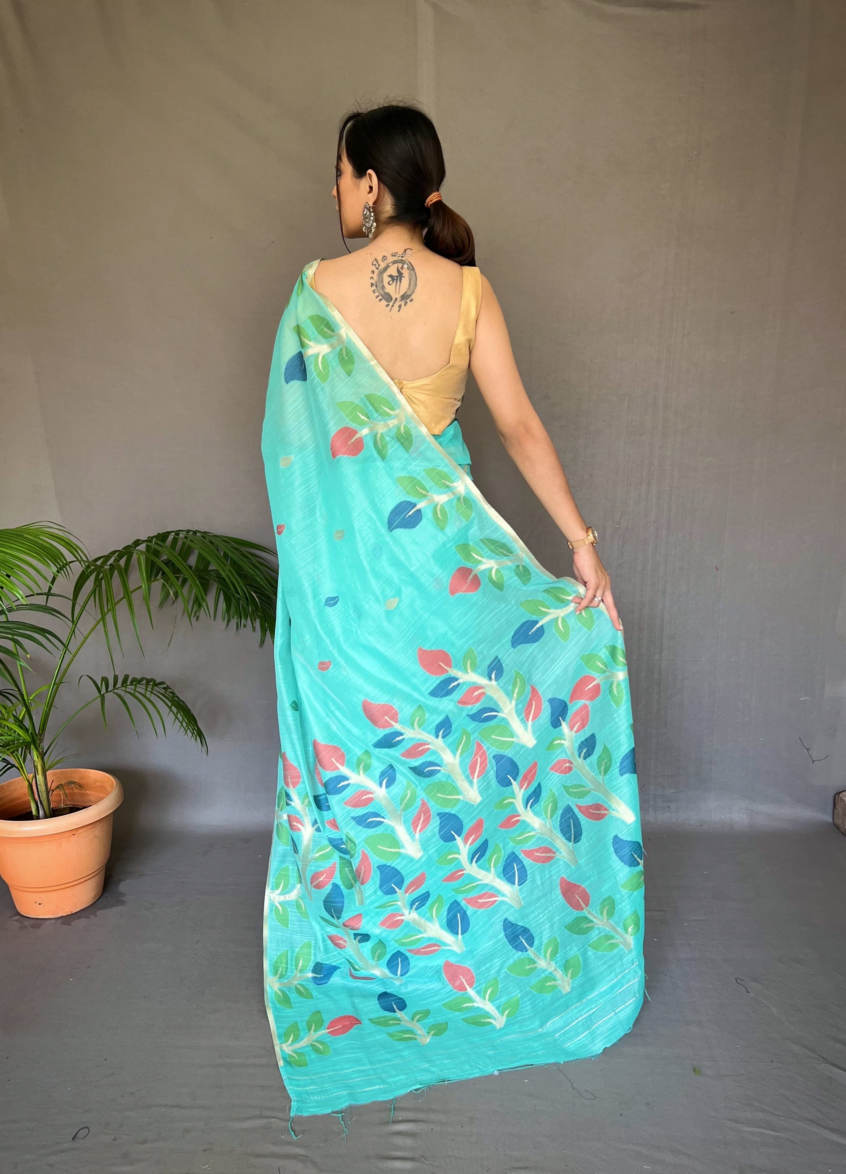 Beautiful Aqua Blue Color Printed Linen Saree With Meenakari Work