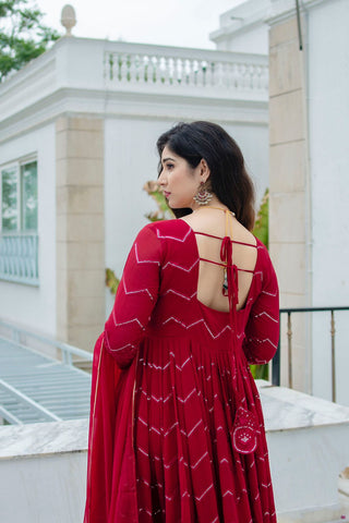 Exclusive Maroon Color Faux Georgette Fabric With Embroidery Work Designer Anarkali Suit