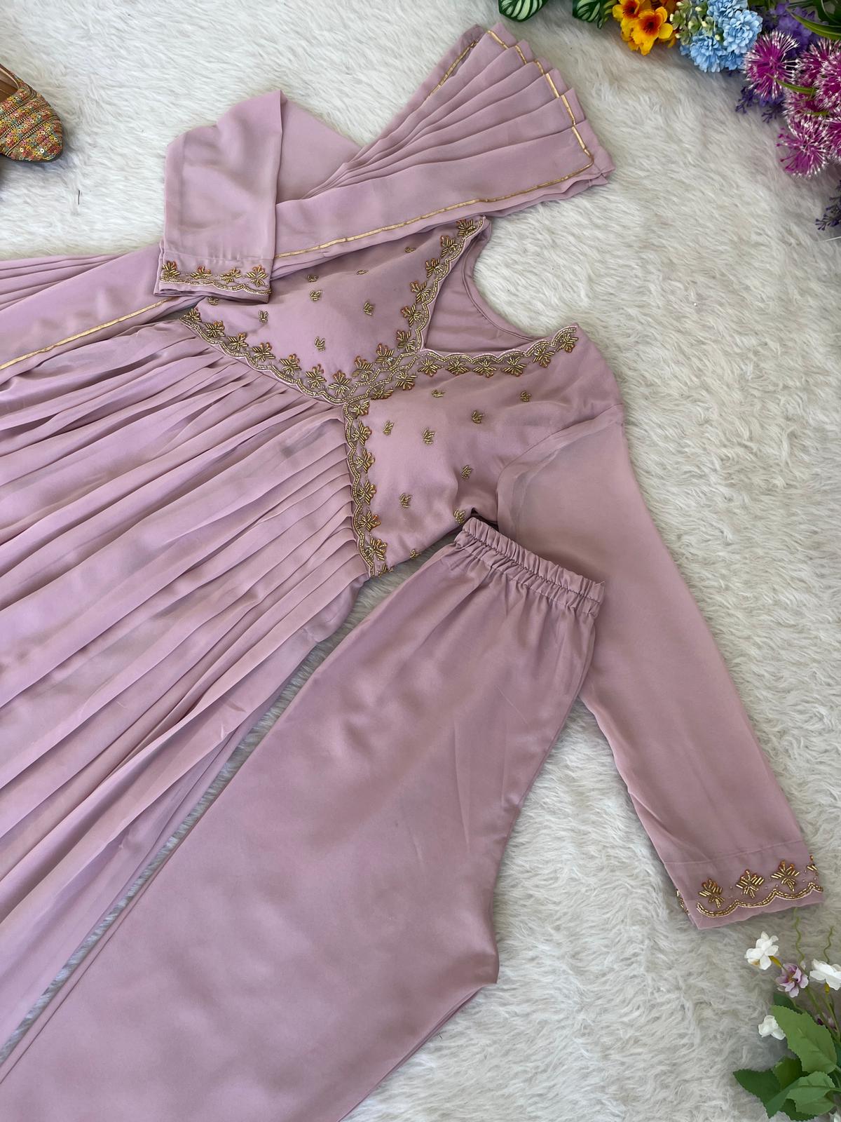 Delightful Dusty Peach Color Georgette With Hand Work Party Wear Gown