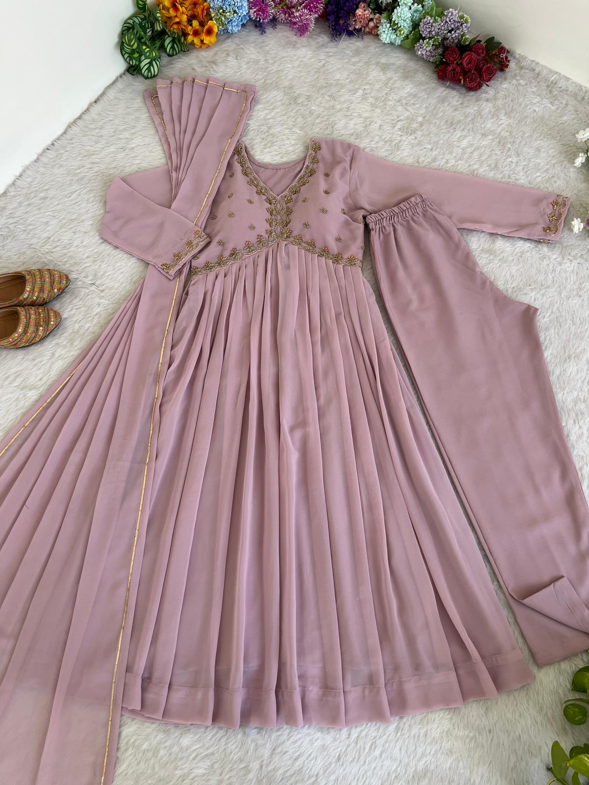 Delightful Dusty Peach Color Georgette With Hand Work Party Wear Gown