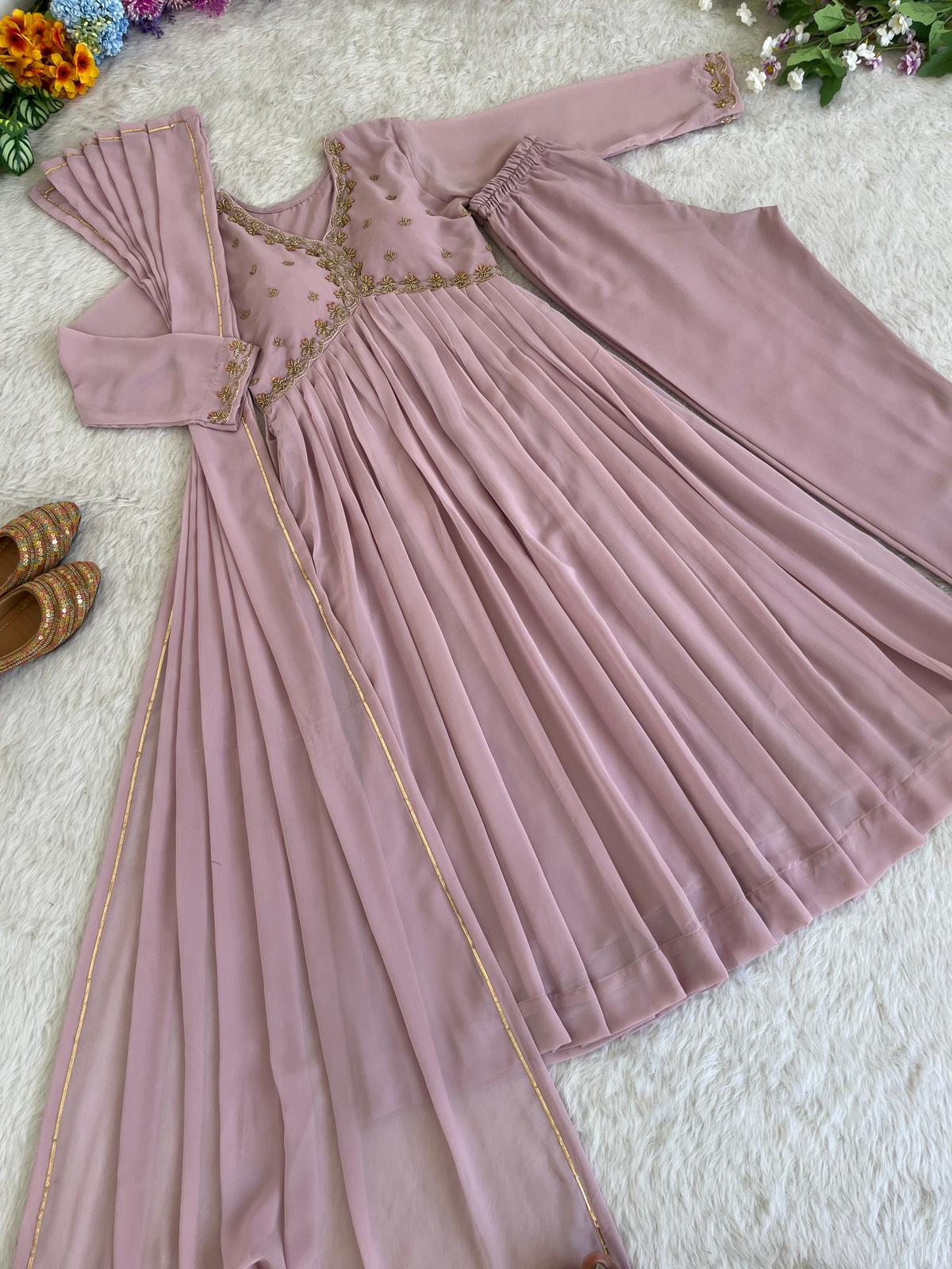 Delightful Dusty Peach Color Georgette With Hand Work Party Wear Gown