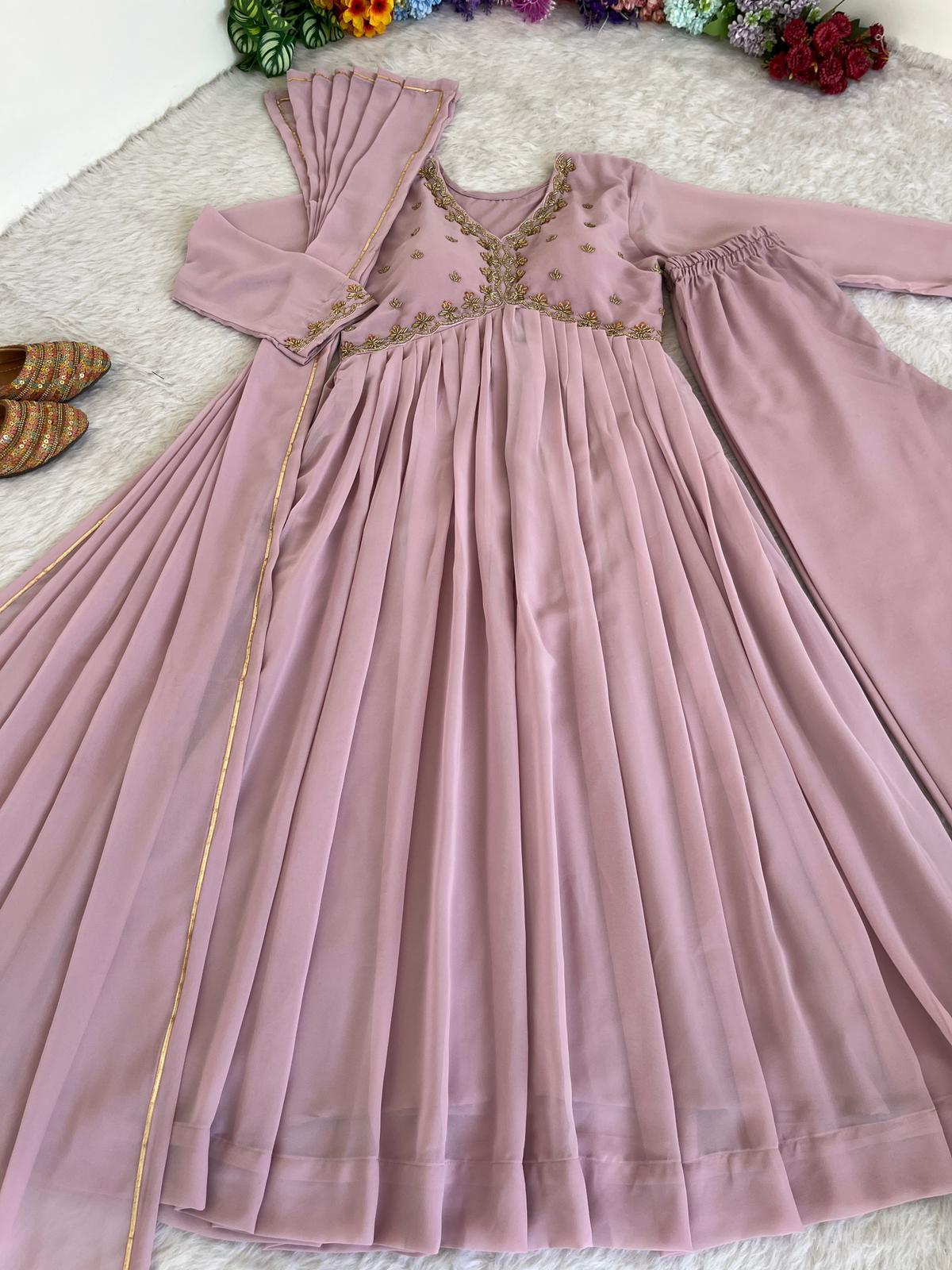 Delightful Dusty Peach Color Georgette With Hand Work Party Wear Gown