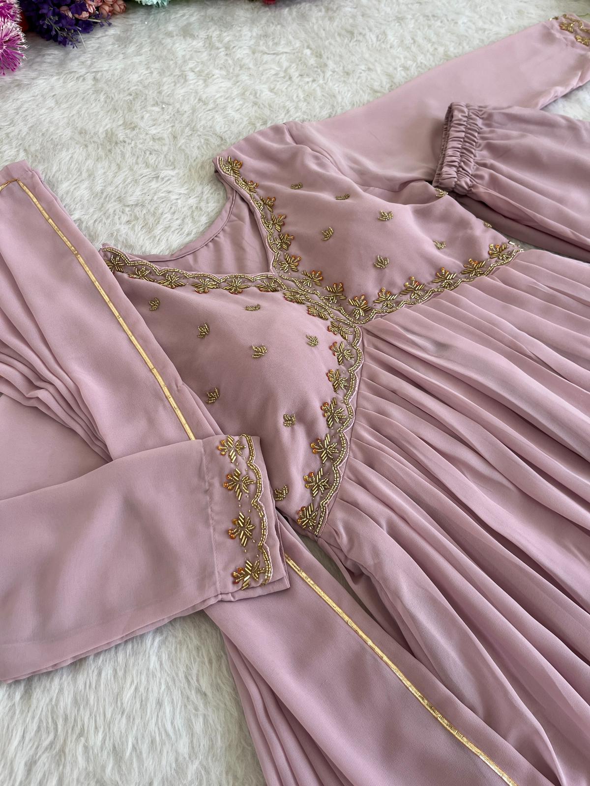 Delightful Dusty Peach Color Georgette With Hand Work Party Wear Gown